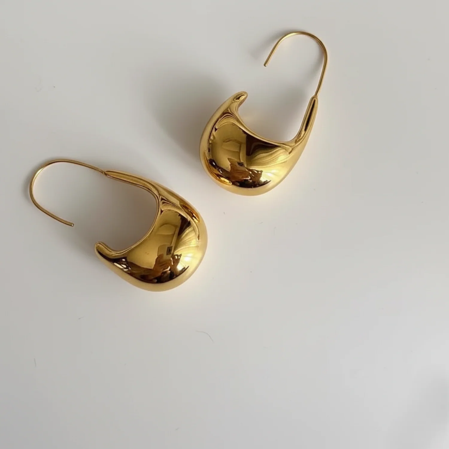 Gold Sculptural Crescent Hoop Earrings