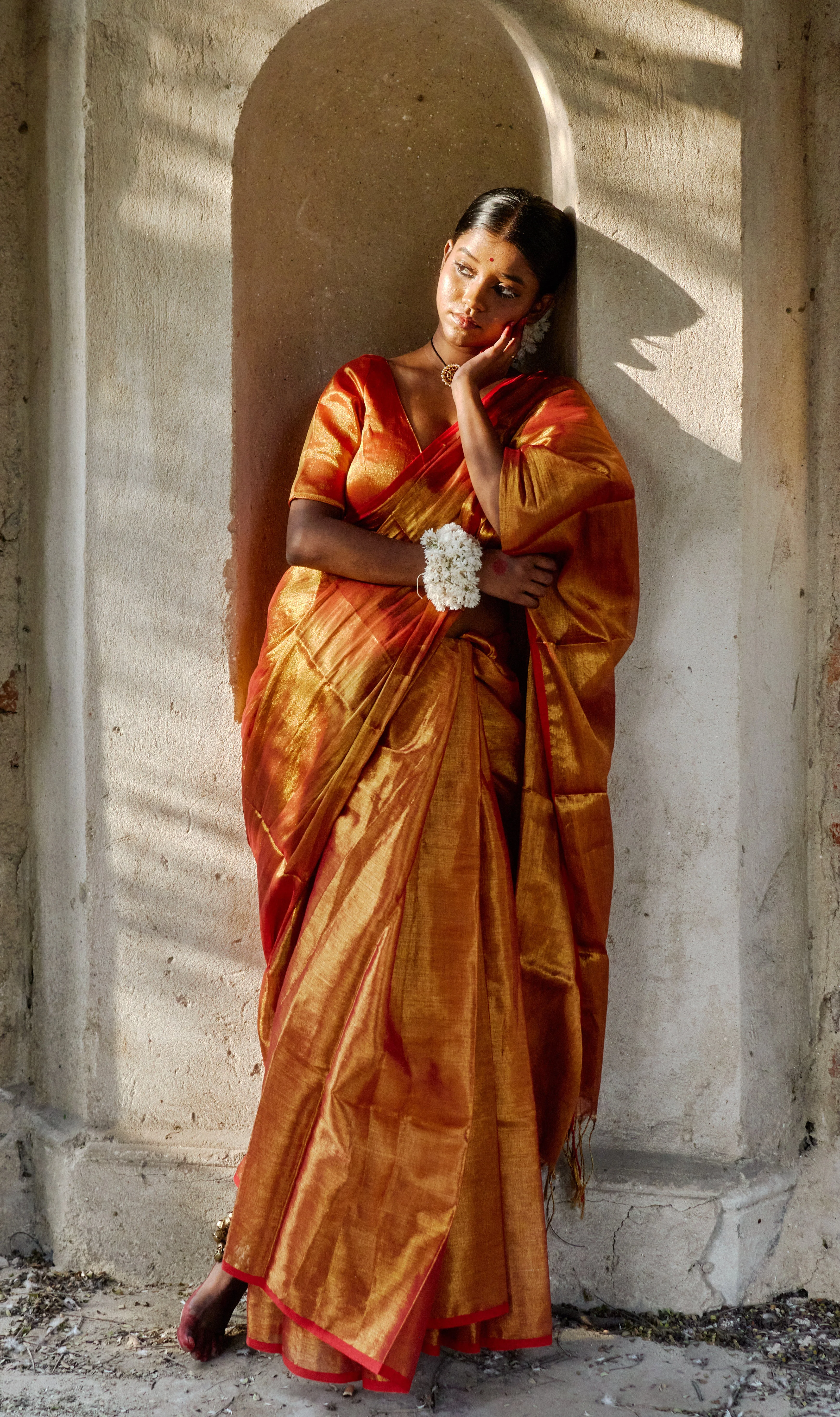 Tripataka Warm Gold Dual Tone Tissue Saree
